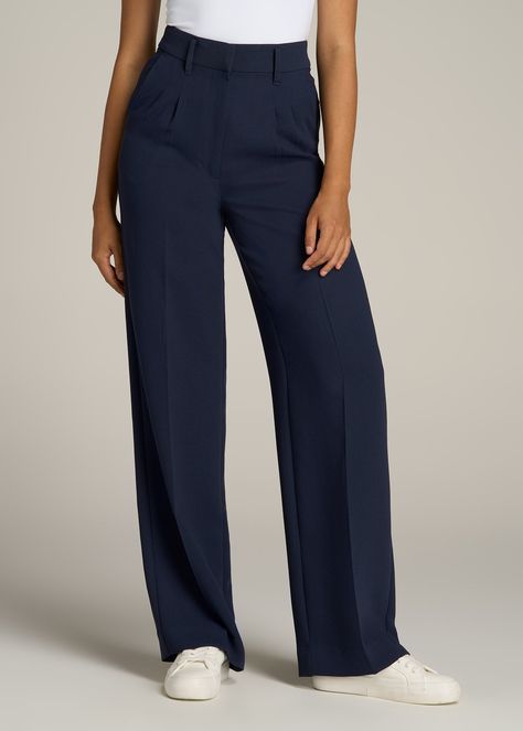 About Our Extra-Long Women’s Dress Pants Make a statement in these stylish pleated women’s tall dress pants. Pleated trousers are a timeless trend you’ll love and now, there’s finally a pair that will accentuate your long legs. These pants for tall women have been designed specifically for ladies between 5’9” and 6’6”, with a full length offering extra-long inseam options. They have a high-rise silhouette that gives the appearance of a cinched waist, complete with a fly zipper and hook and bar c Long Pants Women, Straight Leg High Waist Pants, Pants For Mid Size Women, Formal Pant Designs For Women, Navy Blue Pants Outfit Women Classy, Tailor Trousers Women, Pants Trousers For Ladies, High Rise Dress Pants Outfit, Women Pleated Trousers