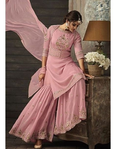 Beautifull pure hand made customised outfit with pastel pink gharara jacket set, gharara border worked with golden zari pink Resham, embellished with sequence Sitara over all on the kameez and gharara work, kameez and gharara material in pure silk, dupatta pure chiffon with 4 side golden border You can customised it in any shape size and with different color combination, 💯% fabric gauranteed, work guaranteed Slightly color changes b'coz of light and resolution 99% same as picture Do not wash in Pink Gharara, Sarara Dress, Pink Sharara, Orang India, Ethnic Wear Indian, Miroslava Duma, Gaun Fashion, Salwar Kamiz, Party Kleidung