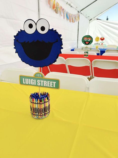 Elmo Party Outfit Parents, Sesame Street Birthday Centerpiece, Sesame Street Party Table Decor, Sesame Street Birthday Party Centerpiece, Dollar Tree Sesame Street Birthday, Sesame Street Table Centerpiece, Sesame Street Birthday Centerpiece Ideas, Sesame Street Centerpiece Ideas Diy, First Birthday Centerpieces Boy