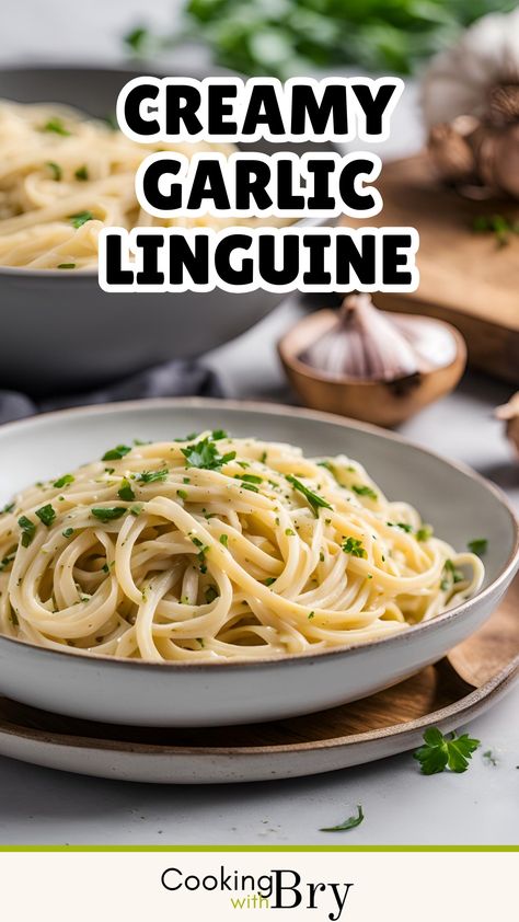 Indulge in a comforting bowl of Creamy Garlic Linguine. This simple yet flavourful dish features tender linguine coated in a rich, velvety sauce made from garlic, cream, and Parmesan cheese. Perfect for a quick weeknight dinner or a cosy meal, the creamy sauce clings to each strand of pasta, delivering a burst of garlicky goodness in every bite. Garnish with fresh parsley and cracked black pepper for an extra touch of freshness. Easy to make and utterly delicious! Creamy Linguine, White Garlic Sauce, Garlic Parmesan Pasta, Linguine Recipes, Garlic Pasta, Quick Weeknight Dinners, Creamy Garlic, Linguine, Creamy Sauce