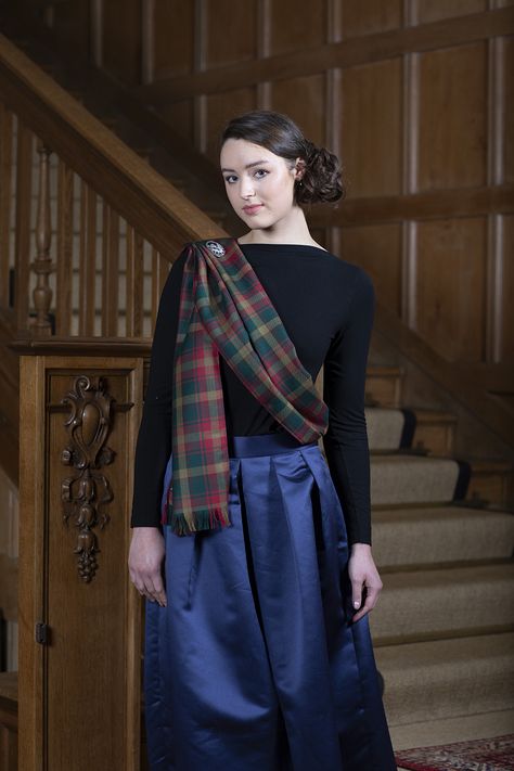 Show off your Scottish clan heritage and incorporate a tartan sash into your ladies’ highland dress outfit. If you are interested in how to style your sash traditionally or looking for inspiration for a more contemporary look, find out more in our guide. Traditional English Clothing, Scottish Outfit Women, Tartan Aesthetic, Tartan Sash, English Clothes, Scottish Dress, Scottish Clothing, Scottish Style, Scottish Fashion