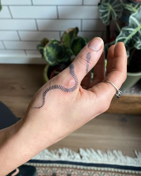 Snake Line Tattoo, Minimal Snake Tattoo, Snake Finger Tattoo, Simple Snake Tattoo, Bite Mark Tattoo, Snake Stick, Japanese Tattoo Words, Cat Tattoo Ideas, Thumb Tattoos