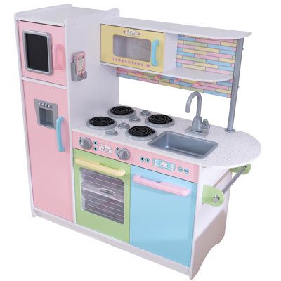 Time to cook up a little fun! Our KidKraft Uptown Pastel Play Kitchen has a hip, modern look that young chefs are sure to love. Every appliance is interactive, including doors that open and close, knobs that turn and click, and a working chalkboard on the freezer door. Crafted from composite wood, this contemporary kitchen is a sturdy and stylish addition to playtime. KidKraft Uptown Kitchen Set - Play Kitchen Sets | Size 41.0 H x 43.0 W x 17.75 D in | Perigold Girls Play Kitchen, Daughters Quotes, Fargelegging For Barn, Play Kitchen Food, Diy Knit Blanket, Toy Kitchen Set, Pretend Play Food, Mexican Party Theme, Play Kitchen Sets