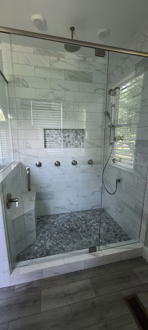 Shower Tile Ideas 1x2, Floor Shower Tile Ideas, Master Shower Remodel Tile, Pebble Wall Tiles Bathroom, Marble Pebble Floor, Shower Tile With Pebble Floor, Marble Pebble Shower Floor, Bathroom Remodel Pebble Shower Floor, Pebble Shower Floors