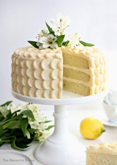 Lemon Layer Cake with Elderflower Swiss Meringue Buttercream | The Brunette Baker Lemon Layer Cake, Indian Cake, Pear Crumble, Lemon Layer Cakes, Crumble Cake, Meringue Buttercream, Swiss Meringue Buttercream, Swiss Meringue, Lemon Cake