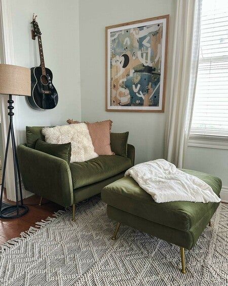 i am beyond thrilled about my new albany park armchair and coordinating ottoman. my living room genuinely needed some tlc and a nice color pop, so the olive velvet chair with gold legs was the perfect update! this chair is velvety soft and oh-so-cozy. it is perfect for relaxing with some tea and read a book. what do you think? check it out on my ltk shop! link in bio #myalbanypark @albanyparkhome Albany Park Green Chair, Green Chair With Ottoman, Green Velvet Reading Chair, Albany Park Chair, Ottoman For Chair, Cozy Corner Chair Ideas, Green Chair Living Room Decorating Ideas, Cozy Accent Chairs For Living Room, Cozy Living Room Chairs