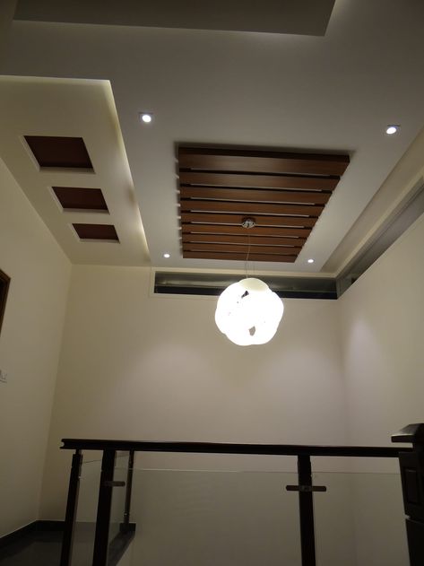 Double height lobby ceiling modern corridor, hallway & stairs by hasta architects modern | homify Ceiling Photos, Simple False Ceiling Design, Sealing Design, Wooden Ceiling Design, Simple Ceiling Design, Plafon Gypsum, Fall Ceiling, Pvc Ceiling Design, False Ceiling Living Room