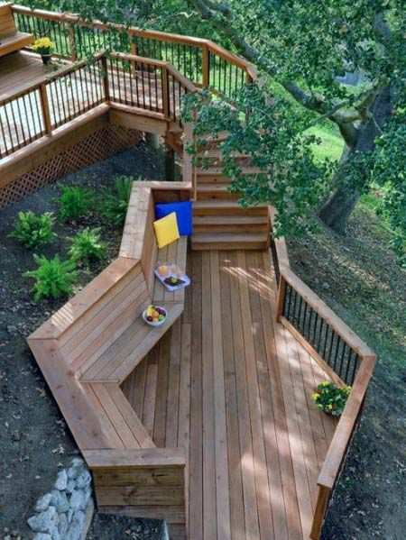 Top 60 Best Deck Bench Ideas - Built-In Outdoor Seating Designs Deck Bridge Walkways, Deck Bench Ideas, Hillside Deck, Deck Bench, Redwood Decking, Sloped Backyard, Wooden Deck, Deck Designs Backyard, Relaxing Outdoors