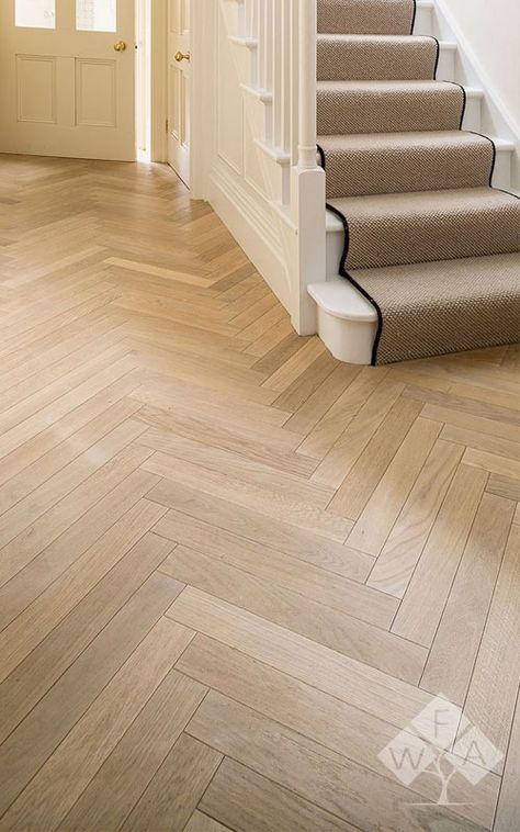 What is not to love about a beautifully installed herringbone wood floor, that is sure to catch the attention of everyone that walks into your home. Living Room Chevron Floor, Herringbone Border Floor, Herringbone Floor Hallway Entryway, Herringbone Engineered Wood Floor, Herringbone Wood Floor Bedroom, Stairs Japandi, Light Flooring Ideas, Herringbone Floor Hallway, Living Room With Carpet Floors