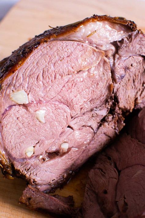 How to cook perfect Boneless Leg of Lamb Recipe every time. Herb crusted and garlic stuffed, this is an easy lamb roast anyone can make! Crock Pot Prime Rib, Lamb Roast Recipes, Boneless Lamb Leg Recipe, Prime Rib Smoked, Slow Cooker Prime Rib, Lamb Leg Recipe, Boneless Lamb Leg, Roasted Lamb Leg, Lamb Recipes Oven