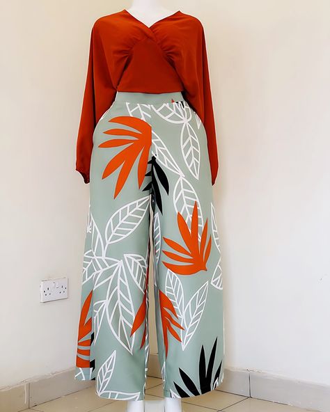 Made in Uganda palazzo pants . KAMU KAMU plaza FF 18 first floor. +256706014499 60,000ugx Palazzo Patterns For Women, Ankara Palazzo Pants, Floral Skirt Outfits, Island Wear, Corporate Dress, Long Gown Dress, Modest Fits, Cute Everyday Outfits, African Design