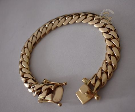 Very impressive authentic Miami Cuban link bracelet, made from solid 18K gold. Made by a Cuban American artist, who specialized in hand crafting Cuban links for over two decades. All our 18K gold Cuban links are made from 18K Plumb (18K+ pure) gold, with ultra high polished finish. Bracelet looks even better in person! Bracelet Specs: - 8 inches long. - 11mm wide. - Weight approximately 89.2 grams of solid 18K gold. This is a custom made Cuban links bracelet listing, and the indicated weight is Miami Cuban Link Bracelet, Gold Cuban Link Chain, Cuban Link Bracelet, Miami Cuban Link, Mens Gold Rings, Mens Gold Bracelets, Miami Cuban, Gold Bracelets, Gold Cuffs