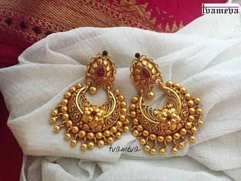 Charming Gold Plated Antique Chandbali From Tvameva. For more details please contact. Seller Name : Tvameva Instagram : https://www.instagram.com/tvameva/ Contact : 9994767370 Related PostsPretty Designer Earrings From Tvameva22K Gold Ruby Earrings From BhimaGold Plated Antique Ruby Jhumka From TvmevaMatt Finish Ruby Coin NecklaceMatt Finish Mango Necklace SetGold Plated Ruby Emerald Maang TikkaGold Plated Antique Earrings … Temple Jewellery Earrings, Gold Earrings Indian, Antique Gold Earrings, Jewelry Designing, Gold Necklace Indian Bridal Jewelry, Gold Pendant Jewelry, Wedding Jewellery Collection, Traditional Earrings, Gold Bride Jewelry