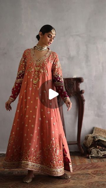 Nadia Farooqui (Official) on Instagram: "@rabiafarooqui.4 takes us through the process behind Nafeesa;

This is ‘Nafeesa’ - which in its own right means intricate! There is a quiet harmony in balance, a beautiful symphony at play in this stunning A-line shirt with contrasting appliques on the sleeves. The intricate amalgamation of zardozi, kaamdaani, resham & gotta speaks of immaculate craftsmanship that sparkles thru on this rust shirt. Add royalty to this regal palette with a two toned chunri dupatta that is made unique with gotta encrusted rings!

Bespoke | Fashion | Luxury | OoTD | HauteCouture | Formals |

Live on www.nadiafarooqui.com
Studio contact: +923468222239
Studio address: 1st floor 1C Lane 6 Bokhari Commercial Area Phase VI DHA

Jewellery : @kohar_jewel 

#NF #nadiafarooqui # Chunri Dupatta, Nadia Farooqui, Pakistani Formal Dresses, Bespoke Fashion, Pakistani Dress, Pakistani Dress Design, Dress Design, Fashion Luxury, Pakistani Dresses