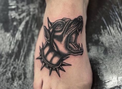 Done by @ charlie_black_tattoo in allstar tattoo, Limerick, Ireland Blackwork traditional foot tattoo, doberman, spiked collar, barking Barking Doberman Tattoo, Traditional Foot Tattoo, German Shepherd Barking, Doberman Tattoo, Spiked Collar, Limerick Ireland, Black Tattoo, Foot Tattoo, Doberman