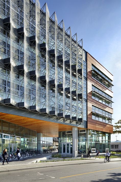 Perkins+Will - CIRS Building - 100% natural daylight and ventilation for all inhabitants; a living roof on the auditorium; BIPV shade operable windows; and wood structure is FSC-certified... The western façade’s living solar screen is planted with deciduous vines.. will act as a dynamic shading device that responds to seasonal change. In addition to assisting natural ventilation, the publicly accessible atrium is an educational space where all of these strategies are visible. Green Architecture Concept, Green Building Architecture, Shading Device, Will S, Green Architecture, Natural Ventilation, Building Facade, Facade Architecture, Sustainable Architecture