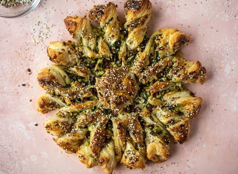 There are many impressively flaky things you can make with store-bought puff pastry —here are our favorite recipes for tarts, hand-pies, and cheese sticks. Spinach Artichoke Puff Pastry, Artichoke Puff Pastry, Pastry Twists, Puff Pastry Twists, Lox And Bagels, Whats Gaby Cooking, Holiday Appetizers Easy, Party Snack Food, Eat This Not That