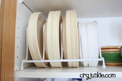 Kitchen organizing tips - I like the way she uses the wire rack for organizing paper plates & has baskets to throw all the tiny-little-cluttery rubber containers and lids. Narrow Pantry Organization, Narrow Pantry, Plate Organizer, Rv Organization, Plate Storage, Camping Organization, Kitchen Organization Pantry, Organization Kitchen, Kitchen Paper