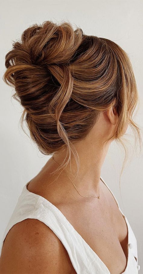 Chic Updos To Elevate Your Hair Game : Messy Chignon with Strands of Hair Left Loose Low Bun Wedding Hair Brunette Messy Updo, Messy Updo For Wedding, Loose Chignon Updo, Hair Updos Elegant, Tousled High Bun, Wedding Reception Updo, High Messy Bridal Updo, Loose Bun For Wedding, Loose High Updo Wedding