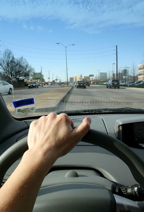 Driver's View. A driver's view out the front window of a vehicle shows other car , #ad, #view, #front, #driver, #Driver, #View #ad Window Image, Cars Driving, Street Image, Art Major, Male Hands, Front Windows, Car Ads, Car And Driver, Wallpaper Design