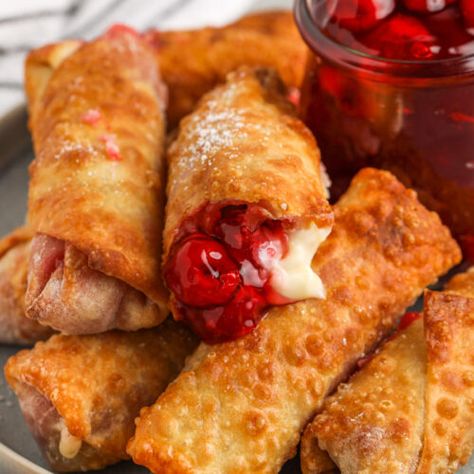 Cherry Cheesecake Egg Rolls - Spend With Pennies Dessert Egg Rolls Recipe, Cheesecake Egg Rolls, No Egg Desserts, Wonton Recipes, Yummy Deserts, Egg Roll Wrappers, Egg Roll Recipes, Cherry Cheesecake, Cherry Recipes