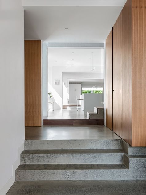 Hallway and Concrete Floor Internal brick walls and polished concrete surfaces provide thermal mass that help keep the interior spaces cool. Concrete Floors In House, New Modern House, Passive House Design, Eco Friendly Interior, Concrete Interiors, Concrete Houses, Passive Design, Concrete Stairs, Concrete Steps