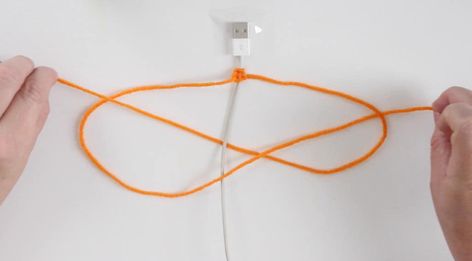 Phone Cord DIY Yarn Wrapped. Learn how to make custom yarn wrapped computer cords with yarn using the Chinese Staircase knotting method. Wrapping Cords With Yarn, Friendship Bracelet Phone Charger, Macrame Cord Cover, Phone Cord Wrap Diy, Crochet Charger Cord, Charger Cord Wrap, Iphone Cord Wrap, Cable Protector Diy, Ladder Craft