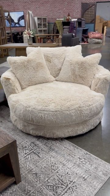 Potato Barn® on Instagram: "Cushy in new fabric!! This JMD Cushy swivel chair arrived to our Mesa location and wait until you FEEL this soft fur fabric. It’s dreamy! @johnmichaeldesigns for Potato Barn Made in USA 🇺🇸 Cushy swivel Style # 36 // 55” round Fabric: Yakety Yak Sand Price: $1495 | gel cushions Wear & care: speak with sales team Avail for purchase in Potato Barn Mesa Don’t live in AZ? Place an order for shipping out of state with our shipping manager or if outside of USA contact our international shipping company JMD International @johnmichaeldesignsintl" Cozy Cubicle, Round Couch, Round Swivel Chair, Issa Vibe, Room Vibes, Amazon Home Decor, Fur Fabric, Boho Design, Comfy Chairs