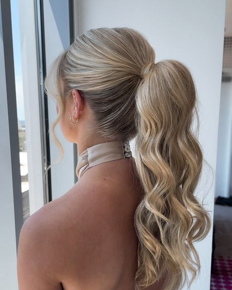 The ponytail is never not a good idea in my opinion 🤷🏼‍♀️⁣ ⁣ Loved that we kept this ponytail simple with some soft textured waves.⁣ ⁣ Her high neck dress, the ponytail - it was a moment🤌🏻⁣ ⁣ The perfect style for a bridesmaid - swipe to see the front because she is gorgeous and SAVE for your bridesmaid hair inspo! Formal Hair Low Ponytail, Hoco Hair Styles Up, Cute Homecoming Ponytails, Braid Into Ponytail Homecoming, Formal Updos Ponytail, Homecoming Hairstyles Low Ponytail, Bridesmaid Hairstyles Ponytail High, Hoco Hair Styles Ponytail, Long Hair Formal Ponytail