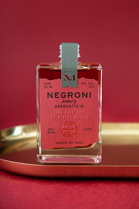 Negroni Abrogatto 18 packaging | Communication Arts Drinks Packaging Design, Bottle Design Packaging, Ready To Drink, Alcohol Packaging, Drinks Brands, Cool Packaging, Alcohol Bottles, Wine Packaging, Premium Packaging