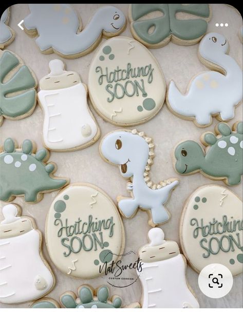 Hatching Soon Cookies, Land Before Time Gender Reveal, Dino Themed Gender Reveal, Greenery Nursery Theme, Baby Boy Shower Cookie Ideas, Baby Dino Baby Shower Ideas, Hatching Soon Cake, Gender Reveal Ideas Dinosaur, Dinosaur Themed Gender Reveal