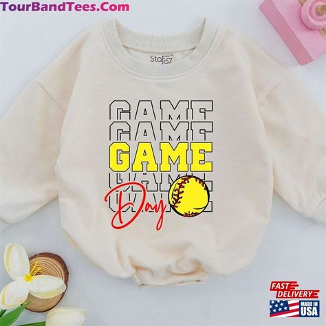 Game Day Softball Baby Onesie Romper Sweatshirt Unisex Check more at https://tourbandtees.com/product/game-day-softball-baby-onesie-romper-sweatshirt-unisex/ Softball Onesie, Girls Baseball Outfit, Toddler Head Wrap, Softball Outfits, Sports Baby Shower, Softball Mom Shirts, Kids Overalls, Sports Baby, Girls Coming Home Outfit