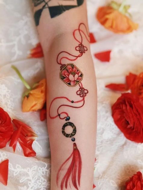 Tattoo uploaded by SION | Lotus pendant flowing on the arm with good luck knot #tattoo #norigaetattoo #fantattoo #peonytattoo #colortattoo #flowertattoo #tattooistsion | 1155336 | Tattoodo Good Luck Knot, Korean Tattoo, Charm Tattoo, Petit Tattoo, Korean Tattoos, Knot Tattoo, Intricate Tattoo, Delicate Tattoo, Lotus Pendant