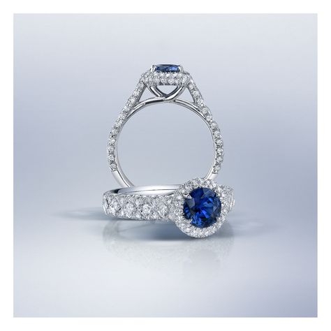 Get engaged with a ring that showcases your personality and connects you to a marvel of nature with a blue sapphire center stone! ⁠ ⁠ 💍 18K white gold ring featuring a 0.92-carat round sapphire accented by a dazzling array of round diamonds. ⁠ ⁠ We'd love to connect you with this ring, carried by one of our trust jewelry store partners.⁠ ⁠ R1253-RC1130-SARD⁠ Gem Engagement Rings, Get Engaged, Round Sapphire, Sapphire And Diamond Ring, Jewelry Designers, Rare Gemstones, Fine Jewelry Designers, Unique Gemstones, White Gold Ring