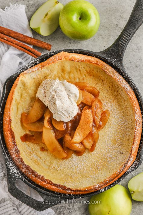 Don't miss out on making this Apple Dutch Baby recipe! It's deliciously fluffy and sweet, with slices of sweet and tart apples baked into a giant pancake in the oven. It's perfect for topping with whipped cream, caramel sauce, and cinnamon sugar. Or try it with fruit preserves or a simple brown sugar and butter topping. Any way it's served, it's sure to be a favorite treat. #appledutchbaby #pancake #recipe #spendwithpennies Impressive Fall Desserts, Apple Dutch Baby, Apple Pie Bread, Pepper Casserole, Mini Meatloaf, Dutch Baby Recipe, Bananas Foster French Toast, Beef Enchilada, Meatloaf Muffins