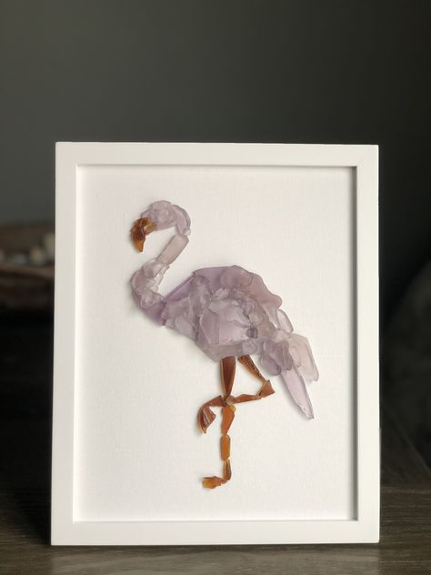 flamingo silhouette with pink seaglass #seaglass #seaglassart #seaglassartist #seaglasssilhouette #seaglassoncanvas #maineseaglass #mainecoast #mainefound #maine #handpicked #coastaldecor #flamingo Flamingo Sea Glass Art, Seashell Flamingo, Seaglass Diy, Seaglass Projects, Flamingo Silhouette, Sea Glass Window Art, Sea Glass Window, Broken Glass Crafts, Sea Glass Diy