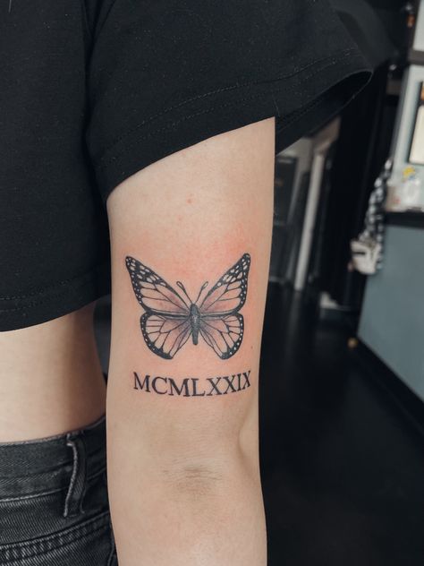 Roman Numeral And Butterfly Tattoo, Butterfly Roman Numeral Tattoo, Butterfly Tattoo With Roman Numerals, Butterfly With Date Tattoo, Roman Numeral Tattoo With Butterfly, Butterfly Tattoo With Date, Tattoo With Roman Numerals, Butterfly Tattoo With Name, Roman Numeral Tattoo Ideas