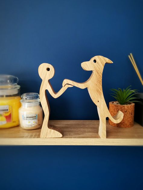 This beautiful wooden statue emphasises the love between man and dog, and would make a lovely gift to those with a four-legged friend to showcase the bond they have! It makes for a lovely centre piece on a mantle and will be a talking point for your guests. Made of solid oak, this sturdy piece will make a great addition to your home. Please note, colour, weight and dimensions may vary due to timber supply. Tall Dog, Wood Log Crafts, Tallest Dog, Scroll Saw Patterns Free, Small Woodworking Projects, Wood Dog, Wood Logs, Wooden Statues, Man And Dog