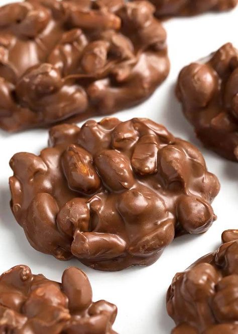 Crock Pot Chocolate Peanut Clusters candy is sweet & kinda salty. This recipe has 3 different chocolates for the best slow cooker chocolate peanut clusters Crockpot Peanut Clusters, Peanut Clusters Recipe, Peanut Clusters In Crockpot, Crock Pot Candy, Crockpot Chocolate, Crockpot Candy Recipes, Chocolate Nuts Clusters, Clusters Recipe, Chocolate Peanut Clusters