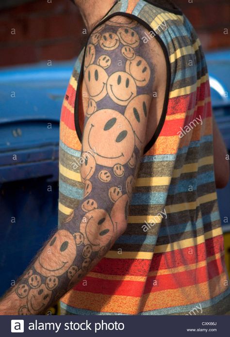 An arm tattooed with smiley faces Stock Photo - Alamy Smile Face Tattoo, Emoji Tattoo, Smiley Face Tattoo, Smile Tattoo, Hippie Tattoo, Watch Tattoos, Bling Wallpaper, Discreet Tattoos, Smiley Faces