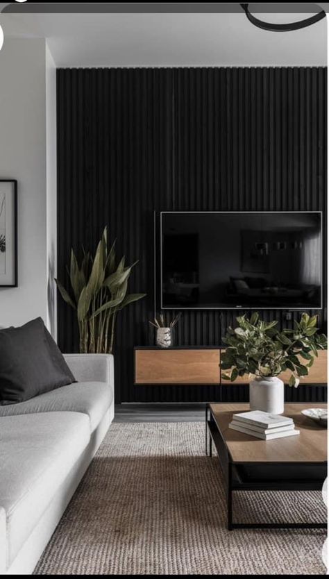 Tv Wall Styling Living Rooms, Wood Slat Wallpaper Living Room, Dark Feature Wall Living Room Tv, Tv On Dark Wall, Tv On A Black Wall, Black Tv Fireplace Wall, Black Wood Slat Tv Wall, Black Wall Tv Living Room, Black Panel Tv Wall