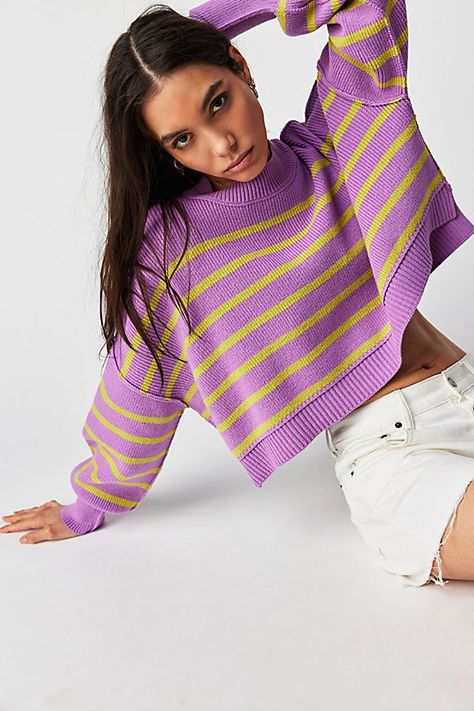 So classic in stripes, this forever essential pullover sweater is featured in a slouchy, cropped silhouette and ribbed knit fabrication with mock neckline, defined seaming, and slightly exaggerated sleeves for added shape. **Fit:** Slouchy, cropped fit **Features:** Mock neckline, striped print, dropped shoulders, defined seaming, exaggerated hems **Why We | Easy Street Stripe Crop Pullover by Free People in Purple, Size: L Crop Pullover, Exaggerated Sleeves, Oversized Jumper, Sweater Oversize, Long Sleeve Pullover Sweater, Knitwear Fashion, Easy Street, Loose Outfit, Mock Neckline