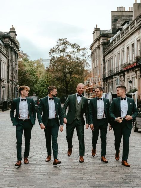 menswear vests and suspenders for your 2024 wedding inspiration Green Suit Men Wedding Groomsmen, Dark Green Suits Groomsmen, Deep Green Groom Suit, Black Green Groomsmen Attire, Dark Green Groom Suit Grey Groomsmen, Dark Green Tuxedo Wedding Groom Style, Green Suit For Wedding Groom, Pine Green Groomsmen Attire, Wedding Green Suits Men