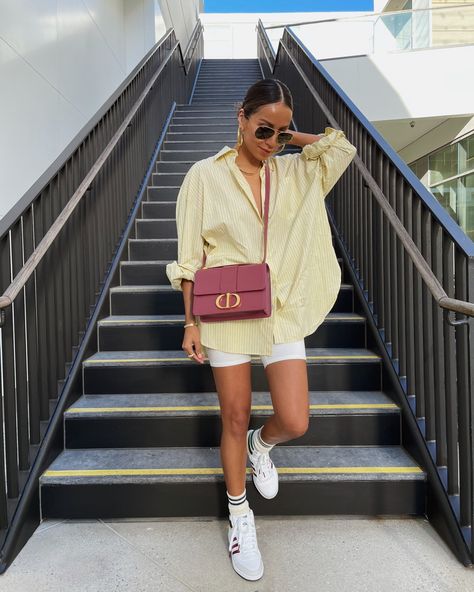 Sincerely Jules wearing pinstripe yellow oversized shirt with biker shorts Zara Street Style, Outfits With Striped Shirts, Oversized Shirt Outfit, California Outfits, Striped Shirt Dress, Cooler Look, Outfit Trends, Summer Outfit Inspiration, Outfits Verano