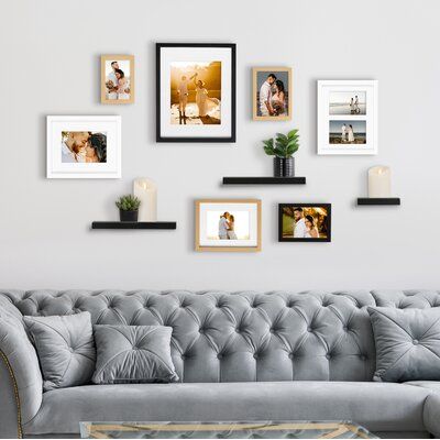 Set the tone of your wall decor with a glamorous wall gallery set. The gallery frame set creates a blend of glam aesthetics and modern design, with a simple profile and gold, white, and black finishes. Bring all your memories together with this one-stop frame and shelf kit for your home! Color: Brown | Latitude Run® 7 Piece 11" x 14" Beveled Gallery Wall Set Frame in Brown, Size 15.0 H x 12.0 W x 0.75 D in | Wayfair Gallery Wall With Floating Shelves, Shelf And Picture Arrangement, Living Room Wall Decor Over Couch, Simple Wall Decor Living Room, Gallery Wall With Shelf, Above Couch Wall Decor Modern, Bare Wall Ideas Living Room, Wedding Photo Wall Home, Above Couch Wall Decor Boho