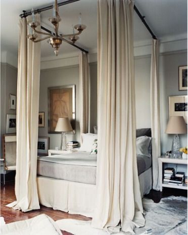 Four Poster Imposter - this photo uses curtain rods but even cheaper would be to use electrical conduit spray painted in the color of choice, i.e. oil-rubbed bronze or black to match the bed. Curtain Rod Canopy, बेडरूम डिजाइन, Reka Bentuk Bilik Tidur, Canopy Bed Diy, Hiasan Bilik Tidur, Diy Canopy, Real Estat, Renzo Piano, Bed Curtains