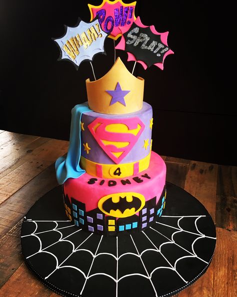 Super hero cake for girls! #superherocake #girlssuperherocake #cakeideas #girlscakeideas #supergirlcake #superherobirthdayparty #girlssuperheroparty #fondantcakes #girlsbirthdaypartyideas #batmancake #supermancake #wonderwomancake #spidermancake Girl Cake Ideas, Cake Superhero, Superhero Girls Birthday, Supergirl Birthday, Girl Birthday Cake, Girl Superhero Party, Superhero Girl, Superhero Birthday Cake, Girl Bday Party