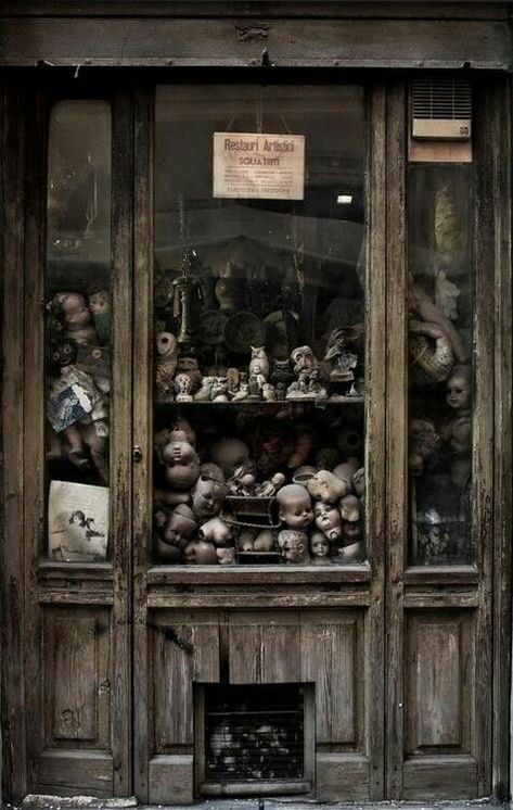 Abandoned: That's not creepy at all...said in sarcastic font..."let's keep a cabinet full of doll heads. They said. It's completely normal. They said." Haunted Images, Urban Exploring, Little Shop Of Horrors, Abandoned Mansions, Peregrine, Haunted Places, Creepy Dolls, Store Front, Abandoned Buildings