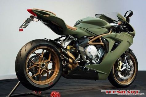 Army green #wrap #motorcycle http://buff.ly/2ak1YcL Matte Green Motorcycle, Mv Agusta F3, Mv Agusta Dragster, Xe Ducati, Мотоциклы Harley Davidson, Menswear Women, Military Color, Motos Harley, Image Moto