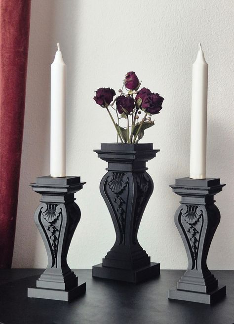 This unique set contains a gothic style vase and one or two fitting candleholders, crafted through 3D printing. If you're into all things Gothic - from the architecture to the lifestyle - this set is gonna be your new favorite thing to show off in your crypt. Vase: Width 40 mm/1.57 in Depth 40 mm/1.57 in Height 170 mm/6.69 in Weight 141 g/4.97 oz Please note, this vase is designed for decorative purposes only and is not suitable for holding water! Candle holder: Width 65 mm/2.56 in Depth 65 mm/2 Goth Style Living Room, Drip Candle Holder, Bedroom Decor Gothic, Classy Goth Home Decor, Romantic Gothic Decor, Gothic Desk Decor, Gothic Apartment Aesthetic, Antique Gothic Decor, Gothic Coffee Shop